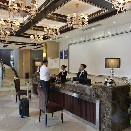 Hôtel Wenhua Herton à Qionghai Extérieur photo