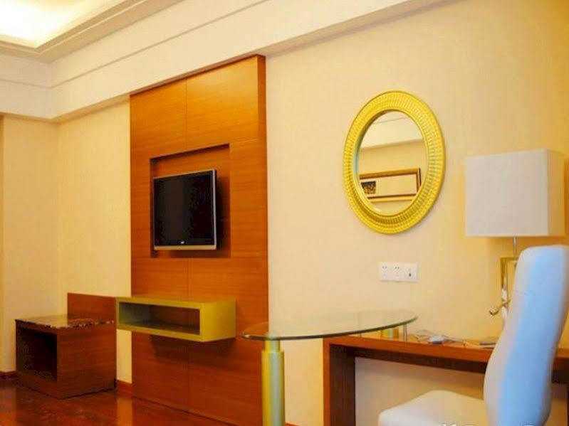 Hôtel Wenhua Herton à Qionghai Extérieur photo