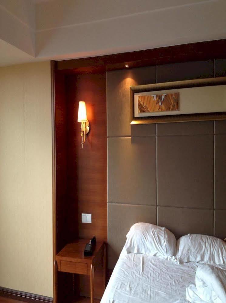 Hôtel Wenhua Herton à Qionghai Extérieur photo